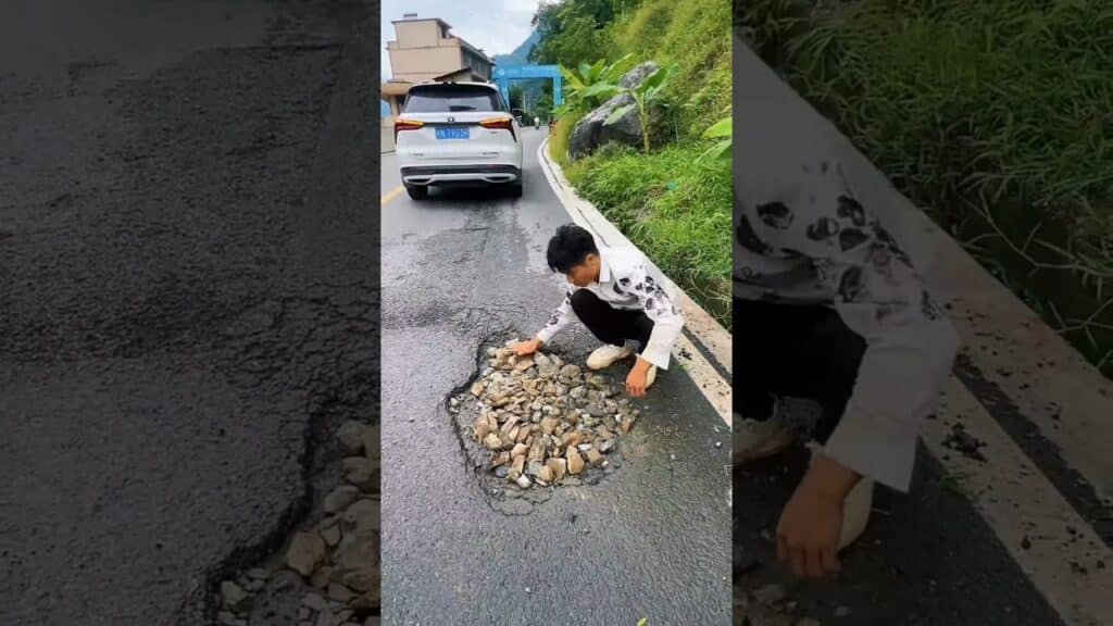 , (nids de poules): Man starts fixing the pothole #short #shorts #trendingshorts #viralshorts #trendingvideo #viral #new|nids de poules,Man starts fixing the pothole #short #shorts #trendingshorts #viralshorts #trendingvideo #viral #new
